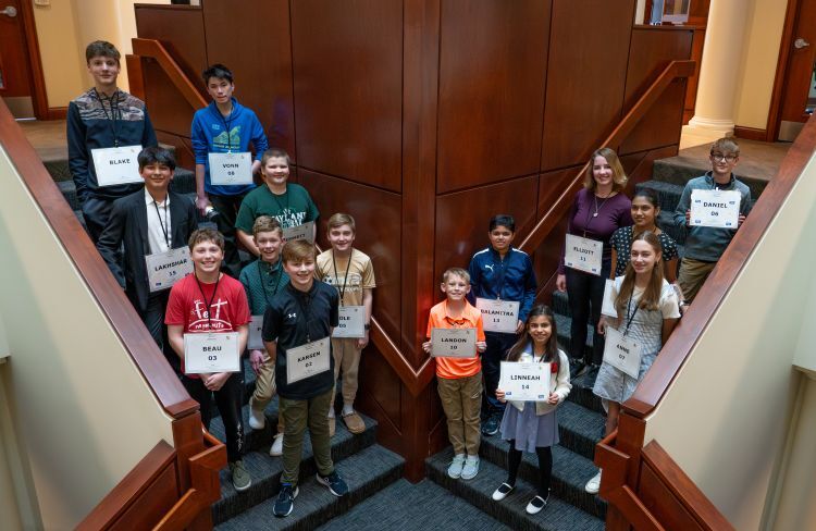 15 students who participated in the Greater Grand Rapids Spelling Bee